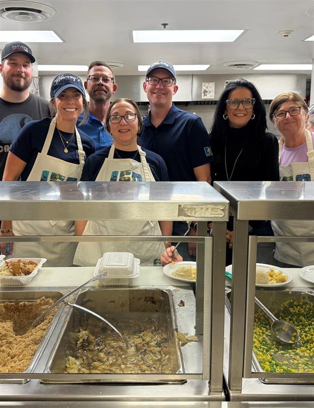 Volunteers participating in a community food program