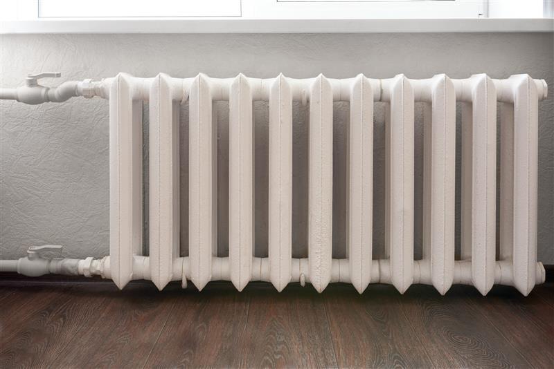 A hot water radiator in a residential home.