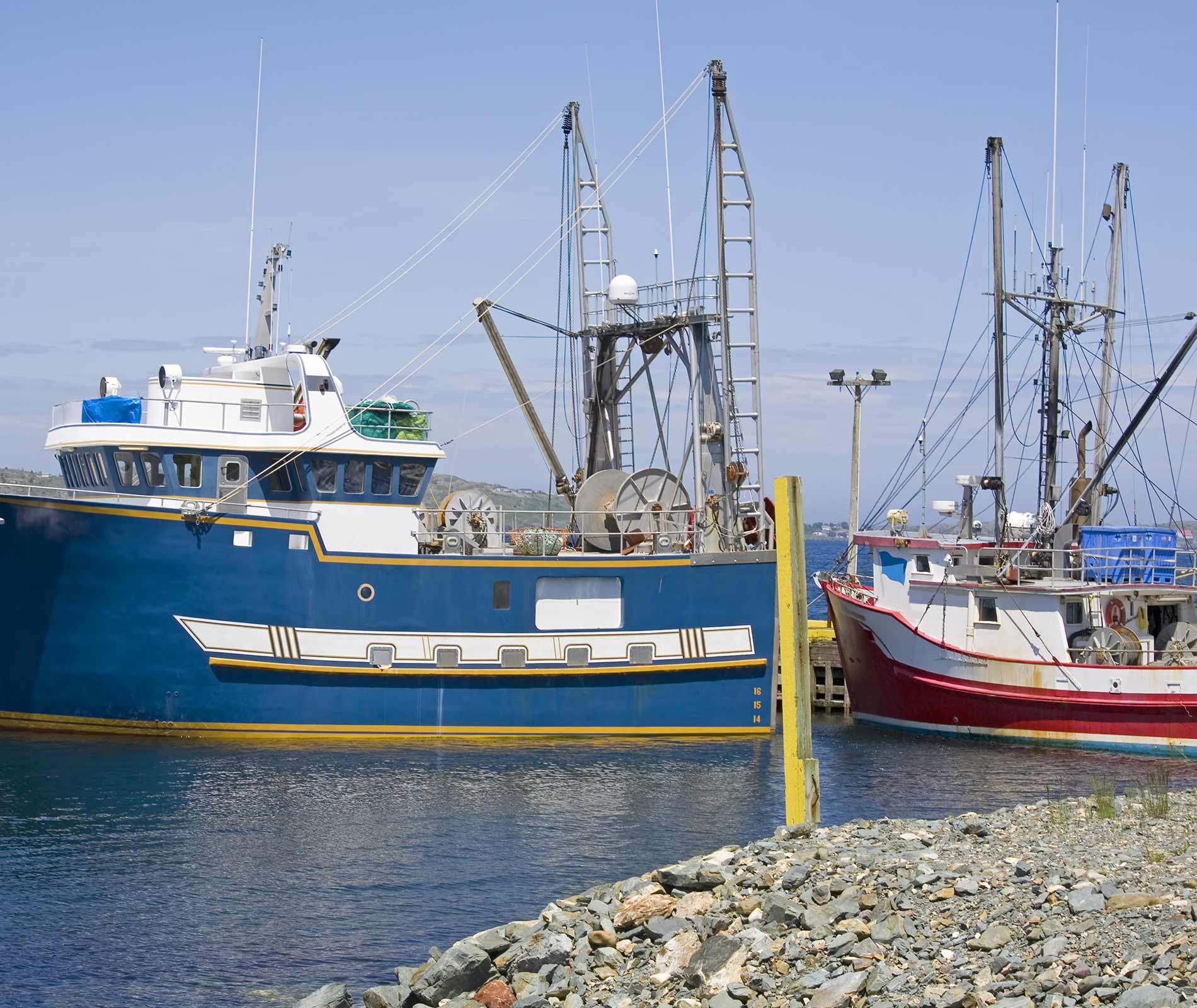 Fishing boats moored at the dock.